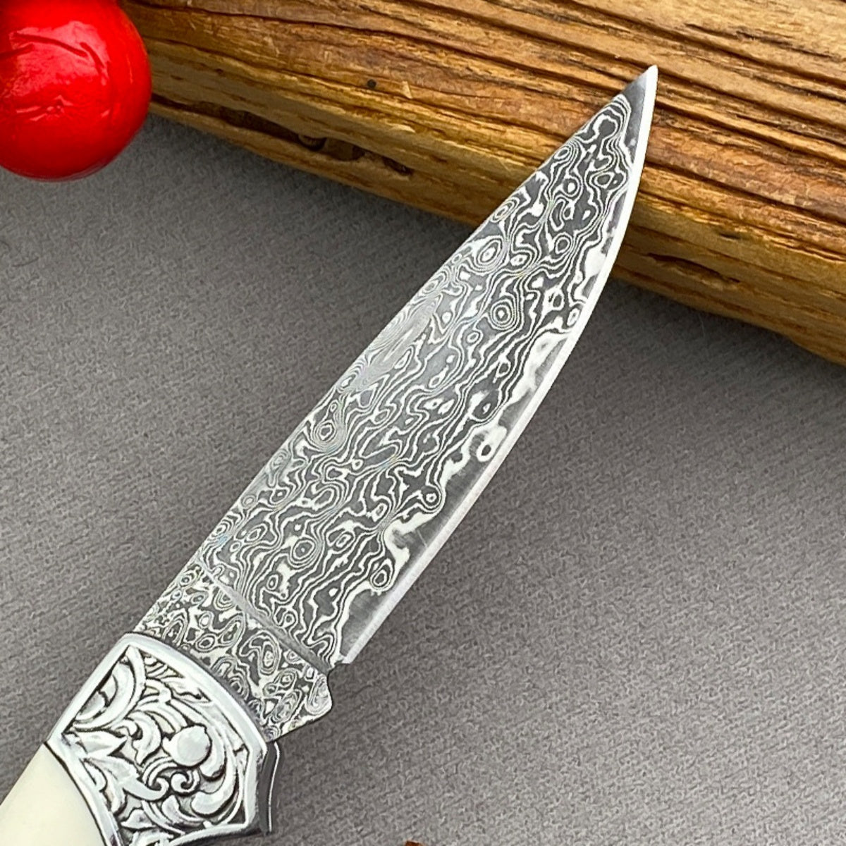 Handmade Damascus Steel Folding Knife Intricate Metal Engravings & Leather Lanyard – EDC Tool for Camping, Hunting & Daily Use